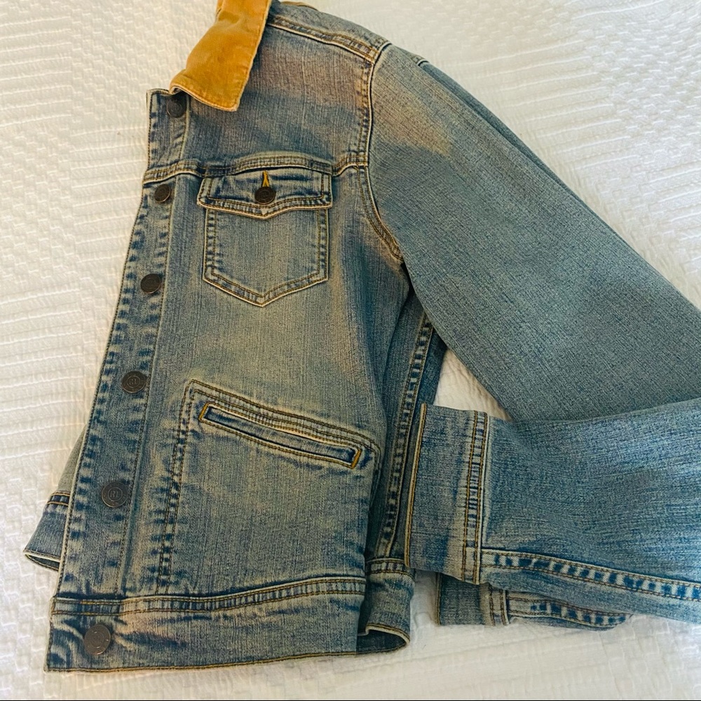 Light grey jeans jacket with U.S Flag on back